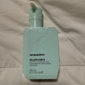 KEVIN.MURPHY Light Blue Hair Care Bottle